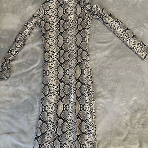 Popular 21 Animal Print Button-Up Blouse in Black & White